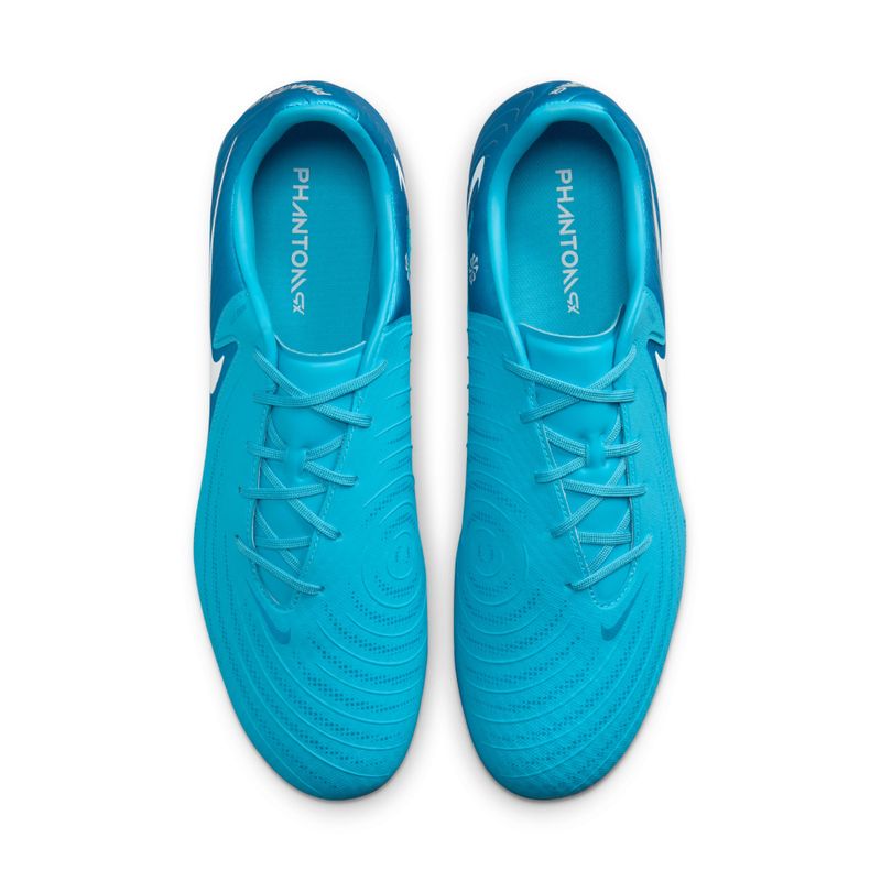 Guayos-nike-para-hombre-Phantom-Gx-Ii-Academy-Fg-Mg-para-futbol-color-azul.-Capellada