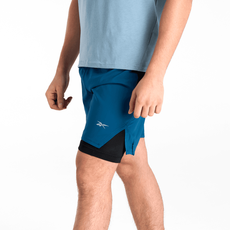 Pantaloneta-reebok-para-hombre-Running-2-1-Short-para-correr-color-azul.-Reflectores