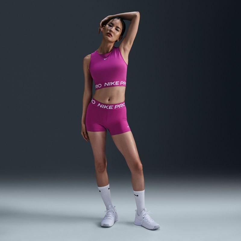 Camiseta-Manga-Sisa-nike-para-mujer-Nike-Pro-Df-365-Crop-Tank-para-entrenamiento-color-rosado.-Frente-Sobre-Modelo
