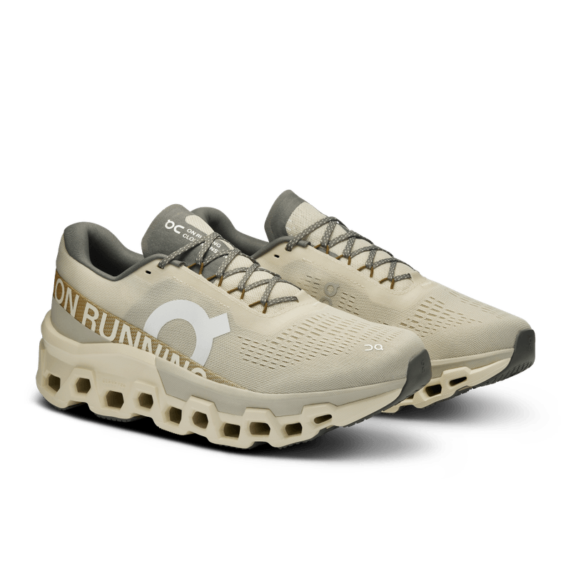 Tenis-on-para-hombre-Cloudmonster-2-para-correr-color-beige.-Par-Alineados-