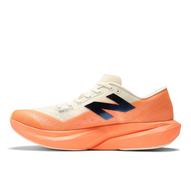 Tenis-new-balance-para-hombre-Rebel-V4-para-correr-color-naranja.-Lateral-Izquiersa