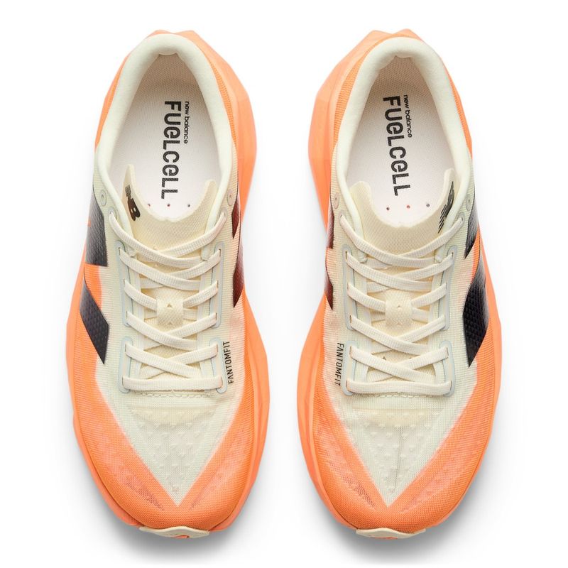 Tenis-new-balance-para-hombre-Rebel-V4-para-correr-color-naranja.-Capellada-Pares