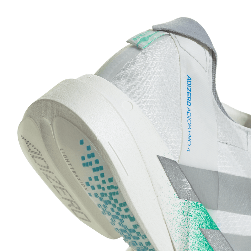 Tenis-adidas-para-mujer-Adizero-Adios-Pro-4-para-correr-color-blanco.-Lateral-Y-Suela