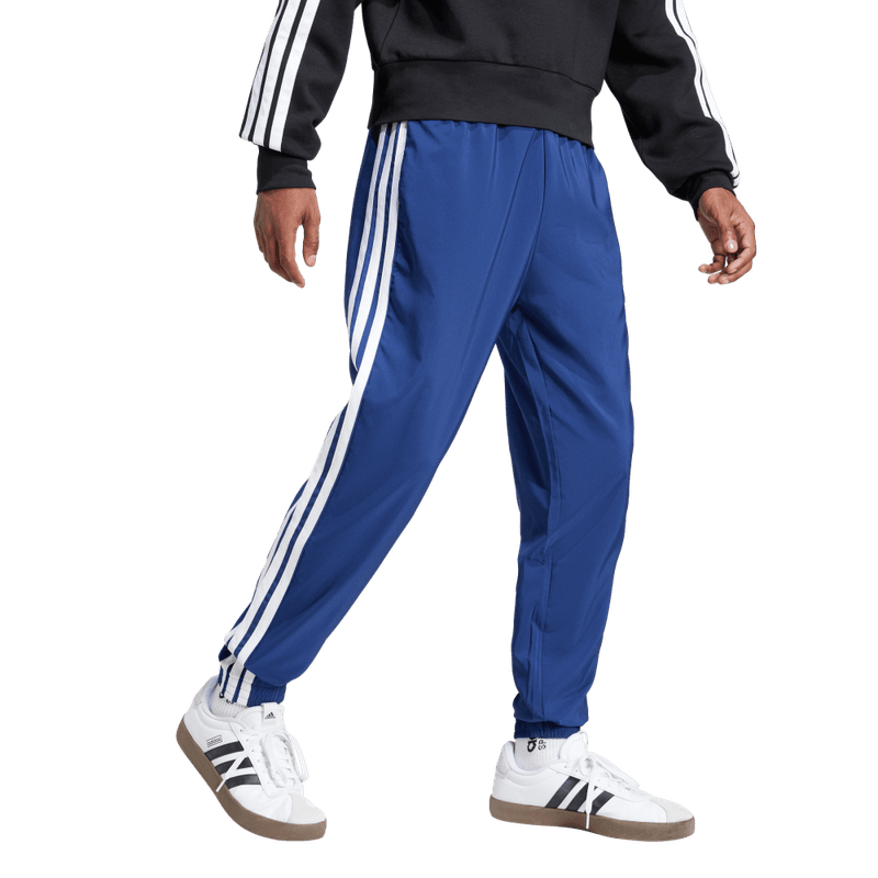 Adidas Pantalon Essentials Rayas Tejido azul de hombre lifestyle