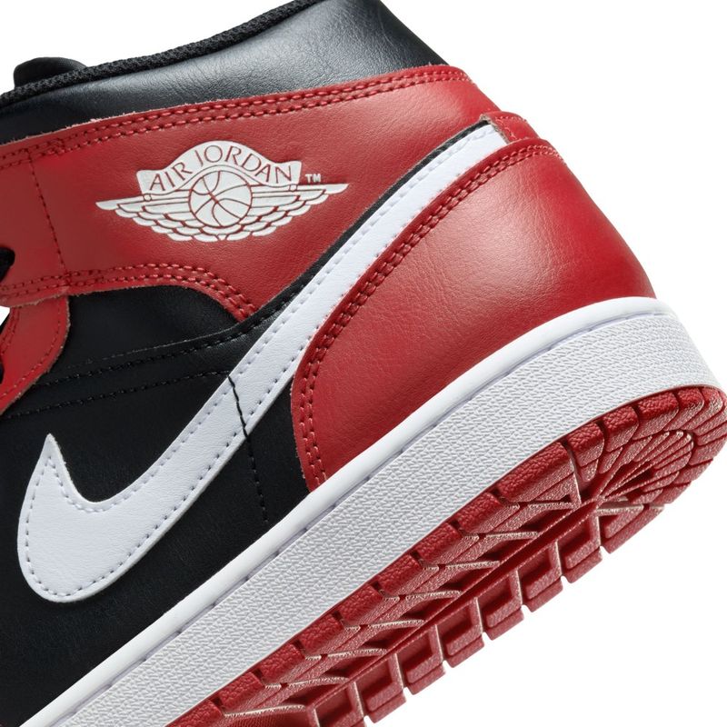 Tenis-nike-para-hombre-Air-Jordan-1-Mid-para-moda-color-negro.-Talon