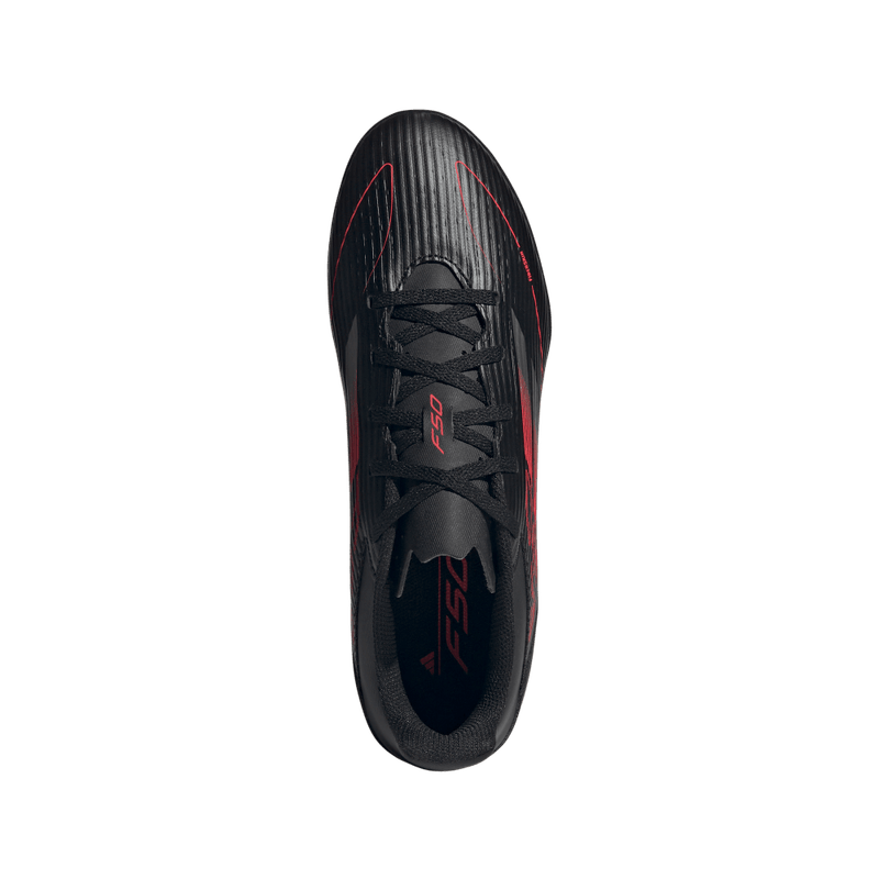 Guayos-adidas-unisex-F50-Club-Tf-para-futbol-color-negro.-Vista-Lateral-Pares
