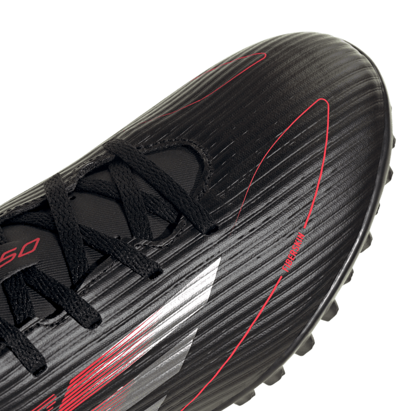 Guayos-adidas-unisex-F50-Club-Tf-para-futbol-color-negro.-Par-Laterales
