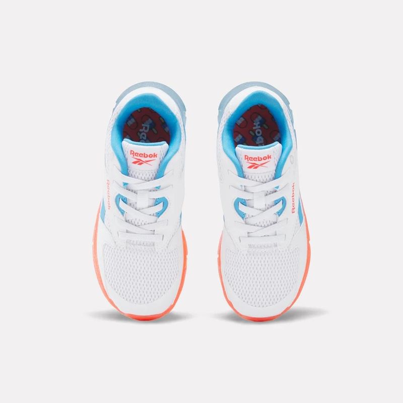 Tenis-reebok-para-niño-Zig-N-Glow-2-Elastic-Lace-para-correr-color-blanco.-Capellada