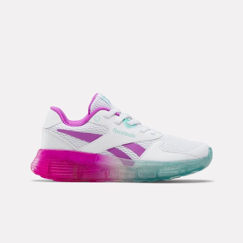 Tenis-reebok-para-niña-Zig-N-Glow-2-Elastic-Lace-para-correr-color-blanco.-Lateral-Externa-Derecha