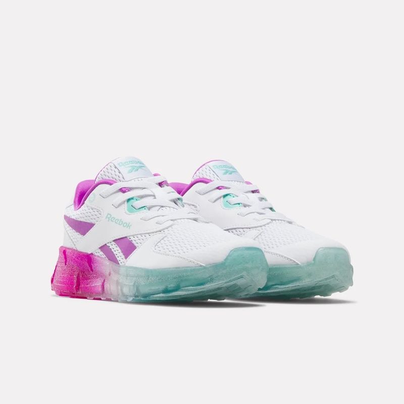 Tenis-reebok-para-niña-Zig-N-Glow-2-Elastic-Lace-para-correr-color-blanco.-Lateral-Interna-Izquierda