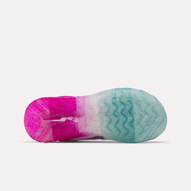Tenis-reebok-para-niña-Zig-N-Glow-2-Elastic-Lace-para-correr-color-blanco.-Suela