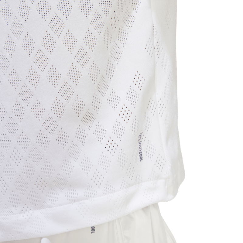 Polo-adidas-para-mujer-Polo-Pro-para-tenis-color-blanco.-Detalle-Reflectivo-Modelo