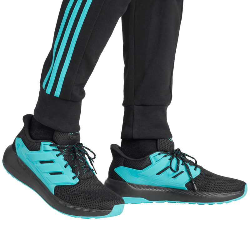 Pantalon-adidas-para-hombre-Mer-Dna-Pnt-M-para-moda-color-negro.-Lateral-Sobre-Modelo