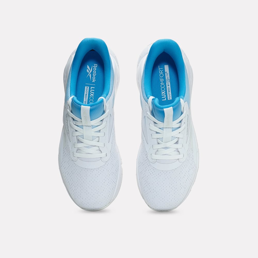 Tenis-reebok-para-mujer-Reebok-Flex-Trainer-para-entrenamiento-color-blanco.-Capellada