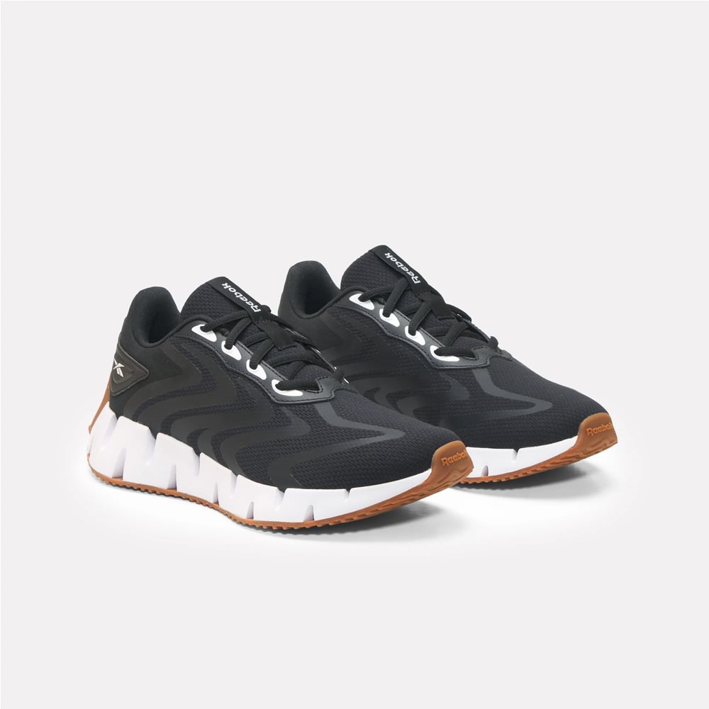 Tenis-reebok-para-mujer-Zig-Rise-para-correr-color-negro.-Lateral-Interna-Izquierda
