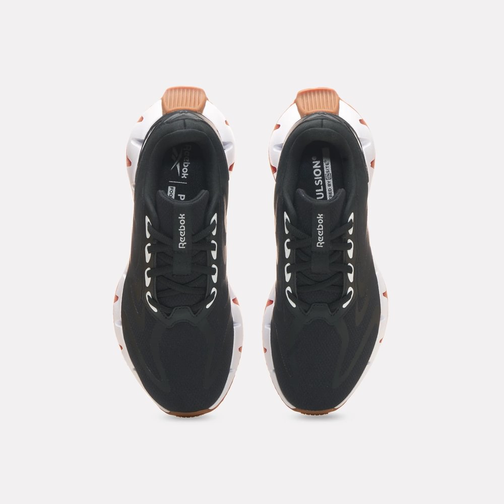 Tenis-reebok-para-mujer-Zig-Rise-para-correr-color-negro.-Capellada