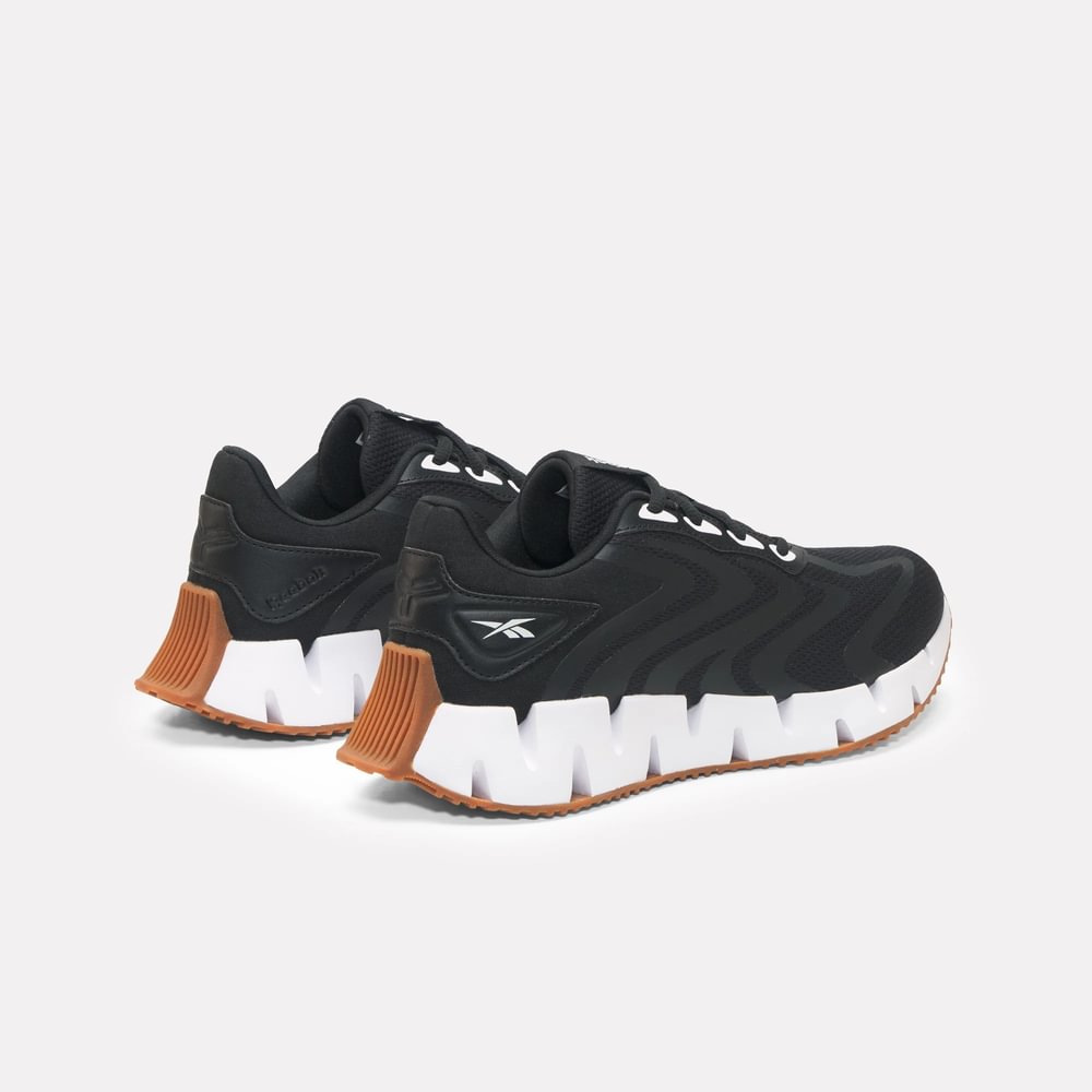 Tenis-reebok-para-mujer-Zig-Rise-para-correr-color-negro.-Suela