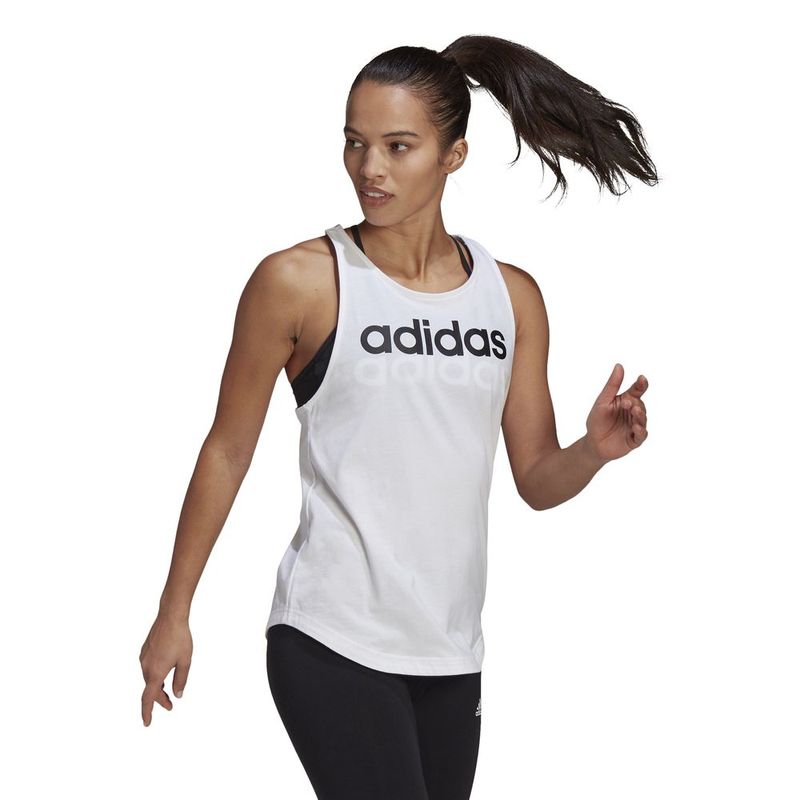 Camiseta-Manga-Sisa-adidas-para-mujer-W-Lin-Tk-para-moda-color-blanco.-Modelo-En-Movimiento