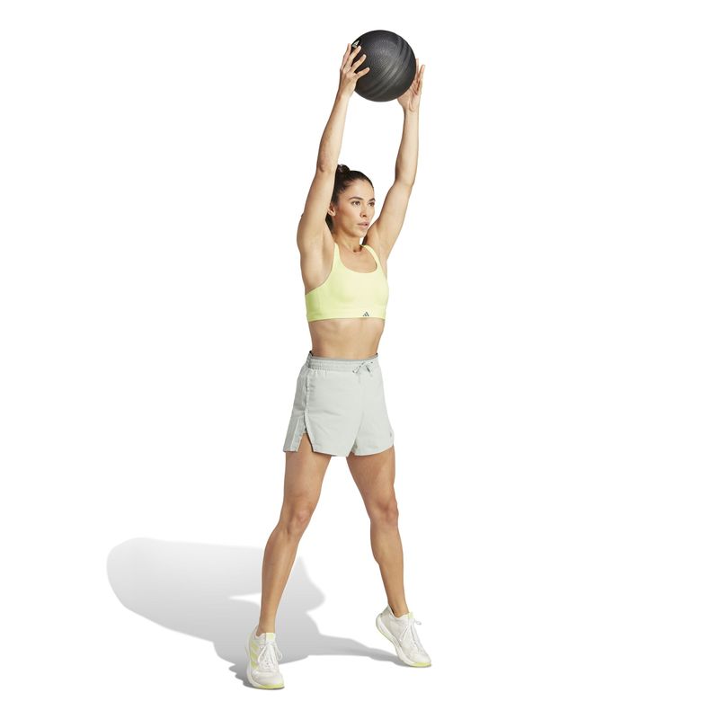 Top-adidas-para-mujer-Tlrdim-Lux-Hs-B-para-entrenamiento-color-verde.-Modelo-En-Movimiento