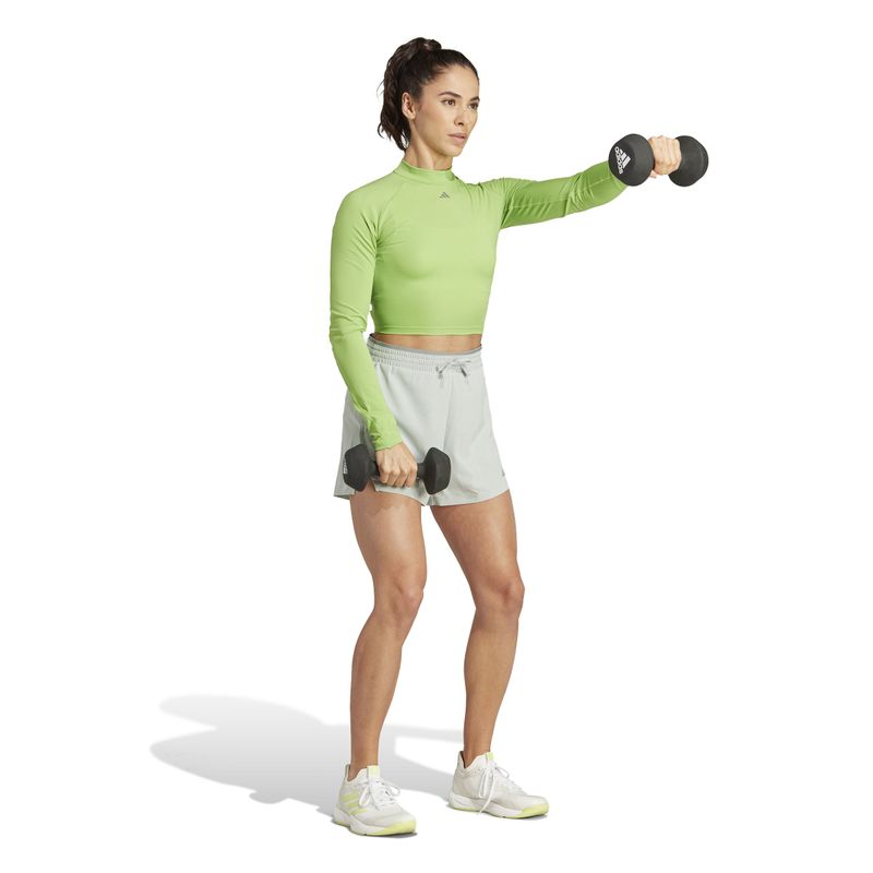 Camiseta-Manga-Larga-adidas-para-mujer-Hiit-Hr-Ls-T-para-entrenamiento-color-verde.-Modelo-En-Movimiento