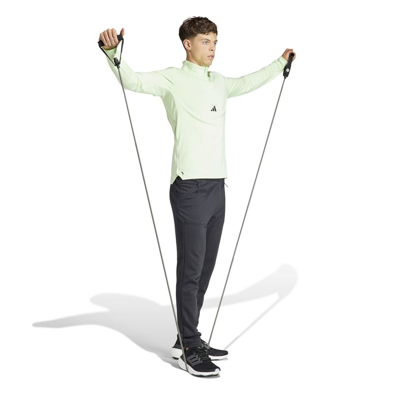 Chaqueta-adidas-para-hombre-Wo-Quarter-Zip-para-entrenamiento-color-verde.-Modelo-En-Movimiento