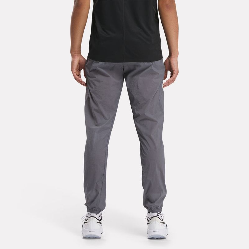 Pantalones reebok hombre gris on sale